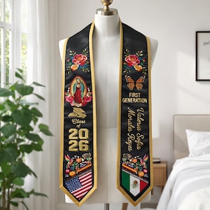 May include: Black graduation stole with gold trim, floral embroidery, and the text "First Generation." Features the American and Mexican flags, the Virgin Mary, and the name Valeria Sofia Morales Reyes. The year 2026 is also displayed.