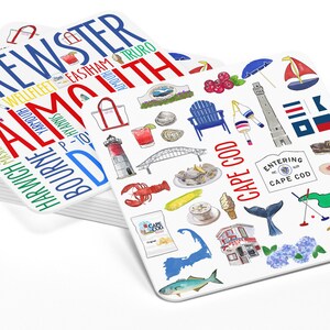 May include: A set of white coasters with colorful illustrations of Cape Cod, Massachusetts. The coasters feature text that reads "Cape Cod" and lists various towns on the Cape, including Chatham, Brewster, Falmouth, and Truro. The illustrations include a lighthouse, a beach chair, a lobster, a whale tail, and a golf course.