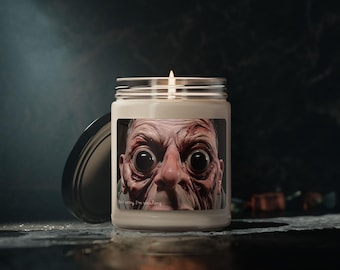 Creepy cute comfort candle with unsettling scary face art funny night decor gift for horror lovers strange aesthetic room vibes