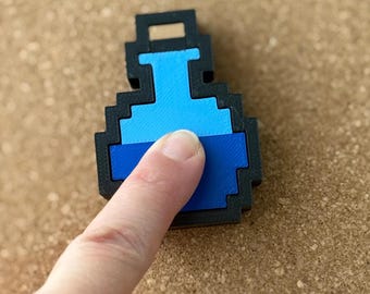 Juguete antiestrés con forma de botella de poción, clicker de pixel art, regalo de videojuego retro, juguete sensorial con interruptor de teclado clicable