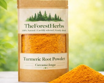 May include: A brown paper pouch containing bright orange turmeric root powder with a clear window. The label reads TheForestHerbs, 100% Natural, Carefully selected, Gently dried, Turmeric Root Powder, and Curcuma longa. A pile of powder sits nearby.