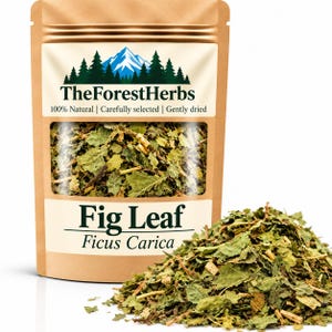 May include: A brown stand-up pouch containing dried fig leaves, labeled TheForestHerbs with a mountain and forest graphic. The text reads Fig Leaf and Ficus Carica. A pile of the same dried green leaves is positioned in front of the pouch.