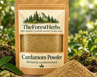 May include: A brown paper pouch containing cardamom powder with a clear window. The label features a mountain and forest illustration, the text TheForestHerbs, 100% Natural, Carefully selected, Gently dried, Cardamom Powder, and Elettaria cardamomum.