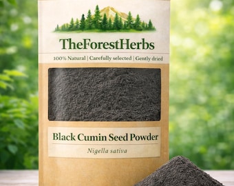 May include: A tan paper pouch containing black cumin seed powder, labelled TheForestHerbs with a mountain and forest graphic. The text reads 100% Natural | Carefully selected | Gently dried, Black Cumin Seed Powder, and Nigella sativa. A pile of the powder sits in front.