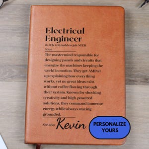 May include: A brown leather-bound notebook with the text "Electrical Engineer" and a definition. The notebook has the name "Kevin" and a blue button that says "Personalize Yours".