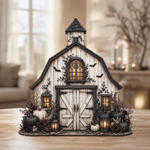 May include: A decorative barn-shaped structure in white and dark gray with a central arched window, double doors, and a small cupola. The exterior is adorned with dark vines, bats, pumpkins, lanterns, and dark floral accents with warm interior lighting.