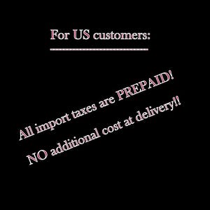 May include: Black background with white and pink text. The text reads "For US customers:" followed by "All import taxes are PREPAID!" and "NO additional cost at delivery!!"