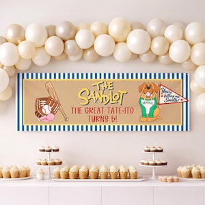 May include: A rectangular party banner with a tan center and blue and white striped borders. It features a baseball glove, bat, and ball, a cartoon dog wearing a green shirt, and text reading The Sandlot The Great Tate-Ito Turns 5!