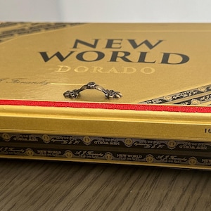Authentic A.J. Fernendez “New World” cigar box turned jewelry box (specifically for necklaces).