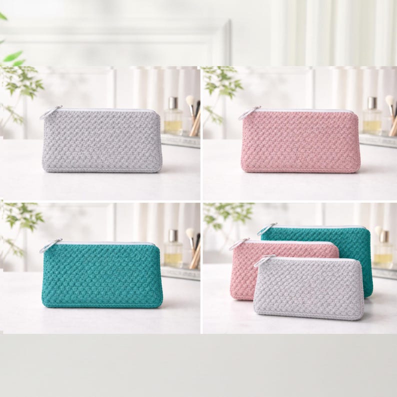 K&ouml;nnte beinhalten: Eine Auswahl an rechteckigen Kosmetiktaschen in Grau, Rosa und T&uuml;rkis. Jede Tasche hat ein strukturiertes, gewebtes Design und einen silbernen Rei&szlig;verschluss. Die Taschen werden auf einer wei&szlig;en Oberfl&auml;che pr&auml;sentiert.