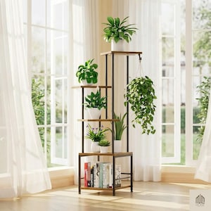 May include: A multi-tiered plant stand with a black metal frame and wooden shelves. The stand holds several potted green plants of varying sizes, including a hanging plant. Books are placed on the bottom shelf. The stand is placed in front of a window.