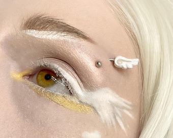 Engelsflügel Piercing