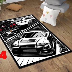 May include: Black and white graphic rug featuring two stylized car illustrations. The rug has a black border and the text "C-4" in red. The cars are depicted in a dynamic, comic book style.
