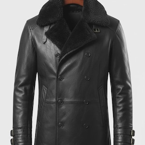 May include: Black leather double-breasted coat with a faux fur collar. The coat features a notched lapel, two rows of buttons, and adjustable straps on the sleeves. A classic outerwear piece.