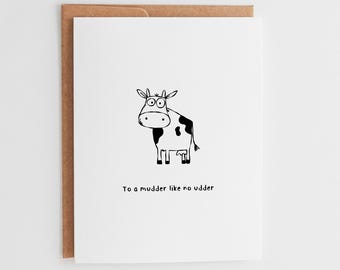Puede incluir: Una tarjeta de felicitación blanca con un sobre marrón. La tarjeta presenta una vaca de dibujos animados en blanco y negro con el texto "To a mudder like no udder."