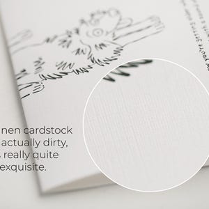 May include: A white linen cardstock greeting card featuring a black line drawing of a dog and the text: You know you're getting older when your back goes out more than you do. Our linen cardstock isn't actually dirty, it's really quite exquisite.