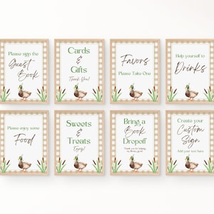 May include: Eight printable signs with a rustic brown and white checkered background, featuring a cartoon duck and cattail illustrations. The signs include text such as "Guest Book", "Cards & Gifts", "Favors", "Drinks", "Food", "Sweets & Treats", "Bring a Book Dropoff", and "Create Your Custom Sign".