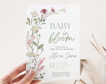 May include: A baby shower invitation with a floral design. The invitation reads "Baby in Bloom" and includes the name "Alice Jane", the date "Saturday, August 20XX", the time "2 PM", and the location "The Spencer Residence, 789 Royal Flora Avenue, Bloomville, CA 33480".