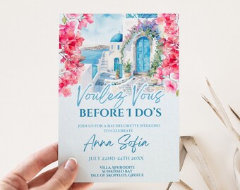 May include: A blue and white watercolor illustration of a Greek island scene with a blue door and pink flowers. The text "Voulez Vous Before I Do's" is written in a cursive font. The text "Join us for a bachelorette weekend to celebrate Anna Sofia July 22nd-24th 20XX Villa Aphrodite Sunkissed Bay Isle of Skopelos, Greece" is written below the illustration.