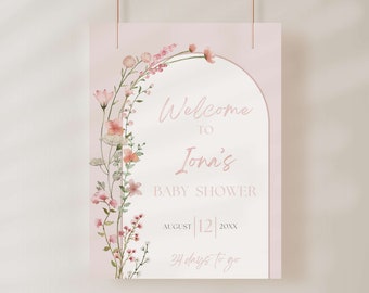 May include: A pink floral baby shower invitation with a watercolor archway design. The text reads "Welcome to Jonas' Baby Shower, August 12, 20XX, 34 days to go."