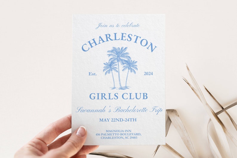 May include: A light blue invitation card with the text "Join us to celebrate Charleston Est. 2024 Girls Club Savannah's Bachelorette Trip May 22nd-24th Magnolia Inn 456 Palmetto Boulevard, Charleston, SC 29403" and a drawing of three palm trees.