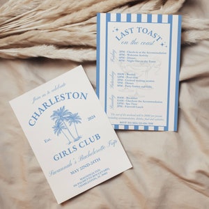 May include: A white invitation card with blue text for a bachelorette party in Charleston, South Carolina. The invitation features palm trees and the text "Charleston Girls Club Savannah's Bachelorette Trip May 22nd-24th".