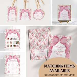 Op de afbeelding: Een set printbare feestversieringen voor een eerste verjaardag. De versieringen hebben een roze strik, een bloemenpatroon en de naam "Madison". De tekst "Madison's Fancy First Year" en "Madison is a Fancy One" zijn in het ontwerp opgenomen.