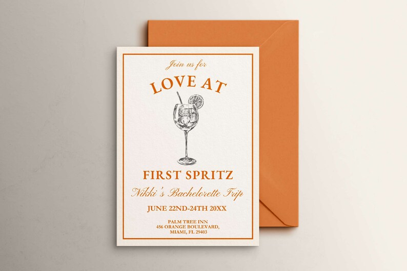 May include: A white card with orange text that reads "Join us for LOVE AT FIRST SPRITZ Nikki's Bachelorette Trip JUNE 22ND-24TH 20XX PALM TREE INN 456 ORANGE BOULEVARD, MIAMI, FL 29403". A black and white illustration of a glass of orange juice with a slice of orange and a straw is in the center of the card.
