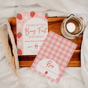 May include: Pink and white gingham RSVP card with a strawberry graphic and the text "RSVP to Ana on 123-456-7890".