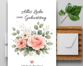 May include: A white greeting card with a watercolor floral design featuring pink roses and green leaves. The card has text in German and includes a small pink heart. A white envelope and a green leaf are next to the card.