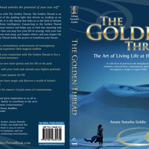May include: Book cover for "The Golden Thread" by Amata Natasha Goldie. The title is in gold lettering against a dark blue background. The book's subtitle is "The Art of Living Life at the Peak". The cover features a desert scene.
