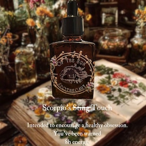 May include: A brown apothecary bottle with a black dropper, labelled "OF THE SUN APOTHECARY." The label features an eye design and floral accents. Text on the image reads "Scorpio's Sting Touch" and "8h energy."