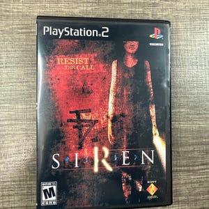May include: A PlayStation 2 video game case for "Siren." The cover features a distressed red and black background with a silhouetted figure and the text "RESIST THE CALL" and "SIREN."