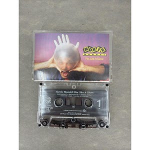 Howie Mandel Fits Like A Glove (Cinta de casete, 1986, Warner Bros., comedia)