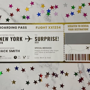 May include: A white and gold boarding pass with the text BOARDING PASS, FLIGHT XX1234, DEPARTING FROM NEW YORK JFK, TO SURPRISE, PASSENGER NAME JACK SMITH, and a scratch-off panel with the text SCRATCH TO REVEAL YOUR DESTINATION, plus a barcode.