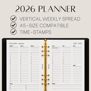 May include: A black 2026 planner with a gold binder. The planner features a vertical weekly spread, is A5-size compatible, and includes time-stamps. The planner's pages are white with black text, showing the days of the week and time slots.