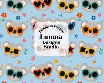 May include: A seamless pattern featuring illustrated grey koala heads on a light blue background. The koalas wear various colorful sunglasses in shapes like hearts, stars, and flowers. Small orange hearts and flowers are scattered throughout the design.