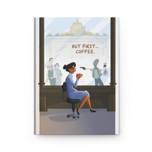 May include: Hardback journal with an illustration of a woman in a blue dress holding a coffee cup, with the text "BUT FIRST... COFFEE." A robber with a gun is in the background. The journal has a white cover.