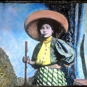 Adelita och Chicana-graffiti i enkaustiker på cigarrlåda