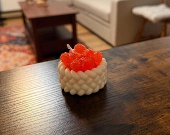 Pequeñas velas decorativas de frambuesa