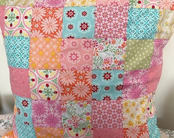 Grote kussenhoes van patchworkstof