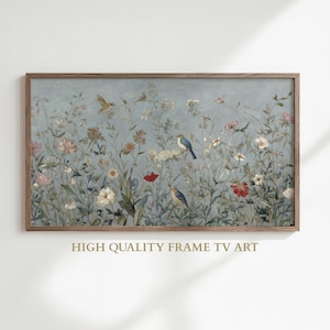 May include: A framed print featuring a serene meadow scene with colorful wildflowers and small birds against a light blue backdrop. The artwork is enclosed in a brown wooden frame. Text at the bottom reads "HIGH QUALITY FRAME TV ART."