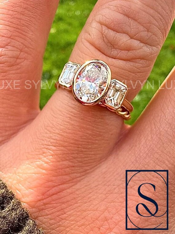 3.5 TCW Oval Lab Grown Diamond Three Stone Engagement Ring, Emerald Side Stones Bezel Set Gold Anniversary Proposal Ring IGI Certified