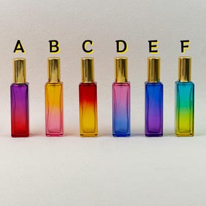 Six gradient perfume bottles labeled A-F, showing all color options clearly on a light background.