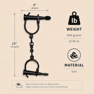 May include: Black iron shackles featuring a central swivel link, measuring 5 inches in width and 13 inches in height. The item weighs 21.16 ounces. Text on the image includes '5" (Width)', '13" (Height)', 'WEIGHT 600 grams 21.16 oz', 'MATERIAL Iron'.