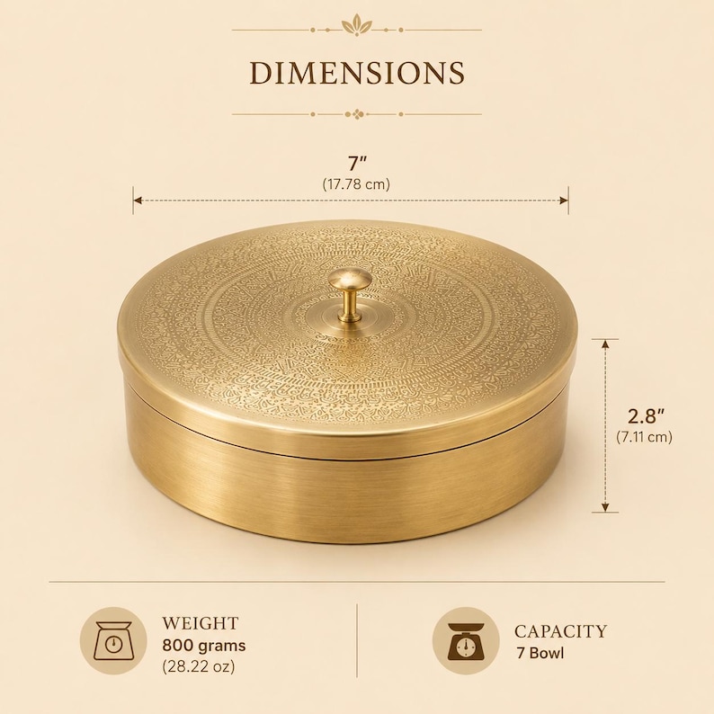 May include: A round brass container with a lid featuring an intricate engraved pattern and a central knob. The container measures 7 inches in diameter and 2.8 inches in height, with a weight of 28.22 ounces and a capacity of 7 bowls.