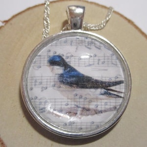 Music Sheet with Martin Glass Silver Pendant