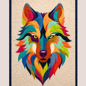 May include: A rectangular fabric wall hanging featuring a stylised wolf head composed of vibrant, multi-coloured fabric patches in shades of blue, orange, green, yellow, and magenta. The wolf is set against a cream-coloured background with quilted patterns.