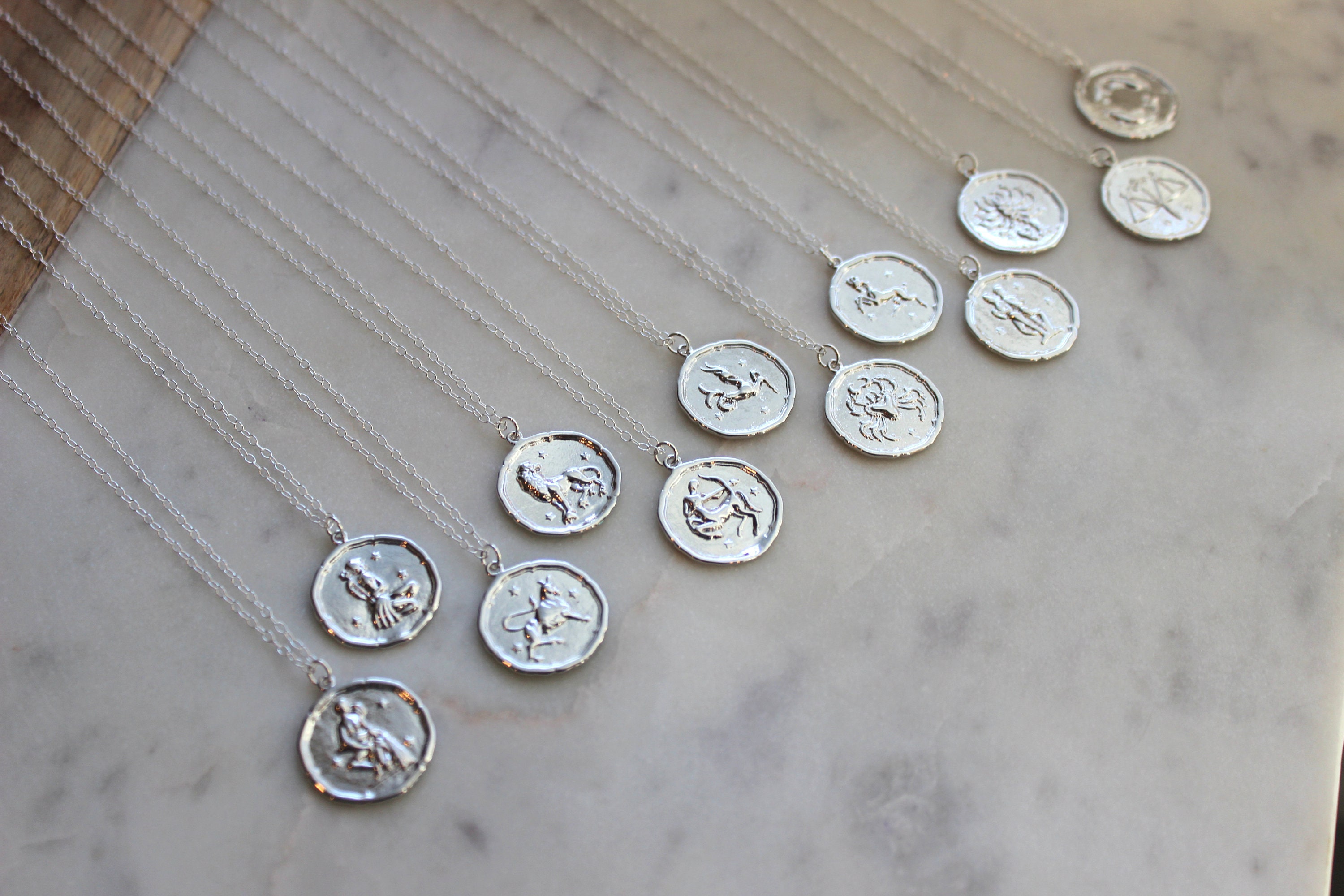 Silver zodiac coin necklace deals