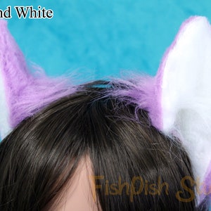 an example of the lilac and white flexi cat ears

these ears are fixed to a metal headband and have wire along the edge for bending into shape